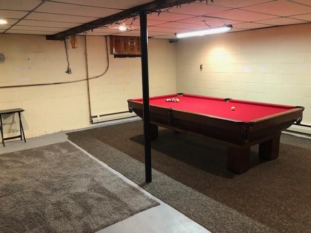 game room featuring a drop ceiling, concrete block wall, and pool table