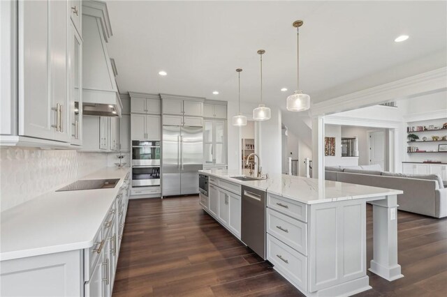 2023 Caymus Ct, Marshall, PA 15005 - kitchen featuring stainless steel appliances, recessed lighting, dark wood-style floors, backsplash, and open floor plan