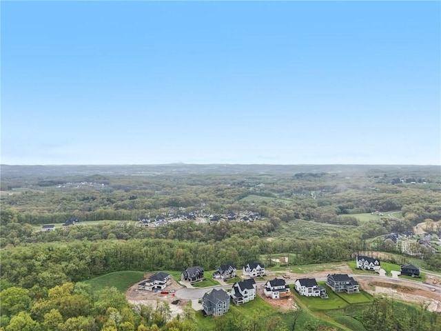 aerial view featuring a forest view
