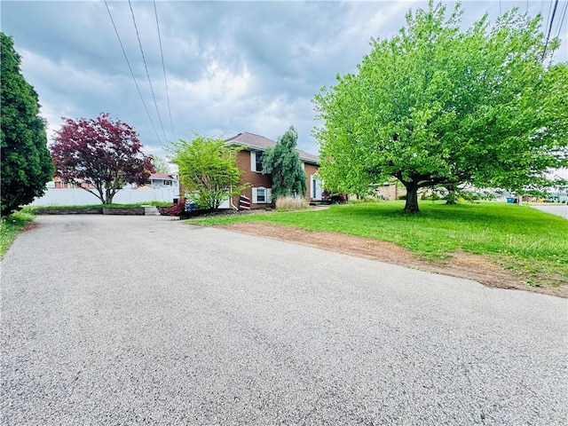 view of front of home with a front lawn
