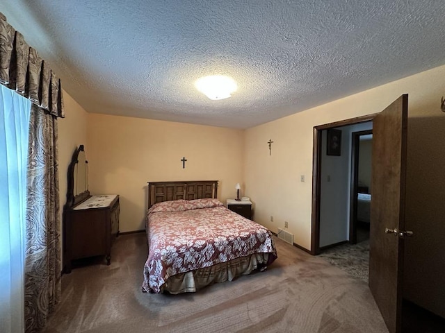 861 Chicora Rd, Oakland Twp, PA 16025 - bedroom featuring carpet flooring, visible vents, and a textured ceiling