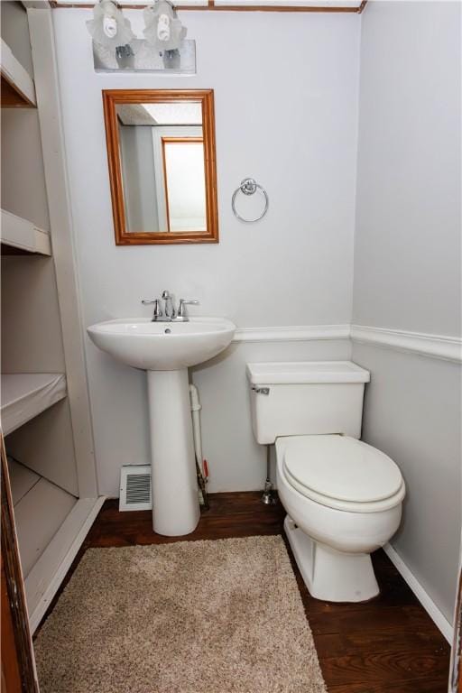 761 Dawson St, California, PA 15419 - half bathroom featuring toilet, a sink, and wood finished floors