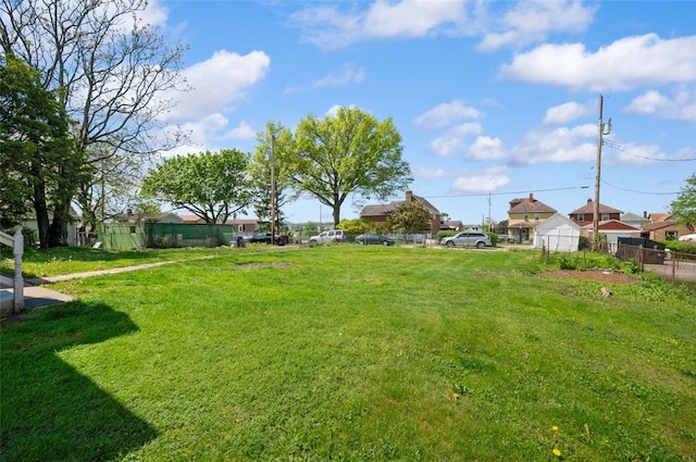 view of yard with fence