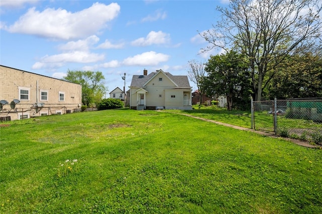 view of yard with fence