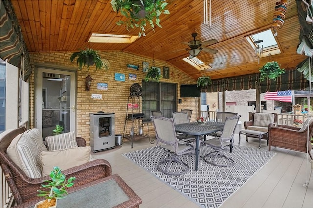 interior space with ceiling fan and an outdoor living space