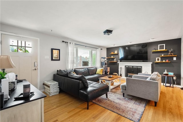 1306 Cochran Rd, Mt Lebanon, PA 15243 - living room with light wood-style flooring, a fireplace, and baseboards