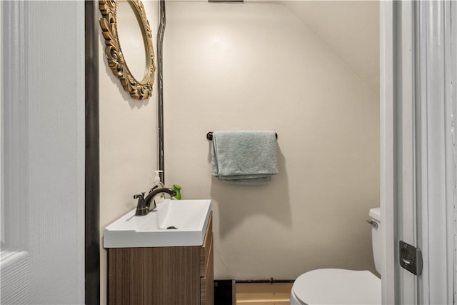 1306 Cochran Rd, Mt Lebanon, PA 15243 - half bath with toilet, vanity, and lofted ceiling