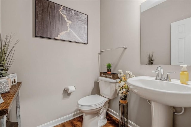 2623 Arno Dr, Oakdale, PA 15071 - bathroom featuring toilet, baseboards, wood finished floors, and a sink