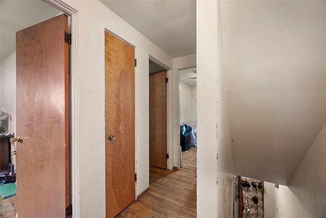 hall featuring wood finished floors