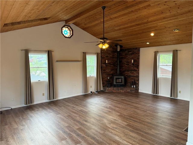 unfurnished living room featuring wood ceiling, wood finished floors, lofted ceiling with beams, ceiling fan, and a wood stove