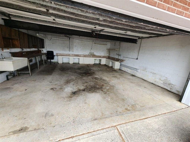 219 Meadow Dr, Westmont Hilltop School District, PA 15905 - garage featuring a sink