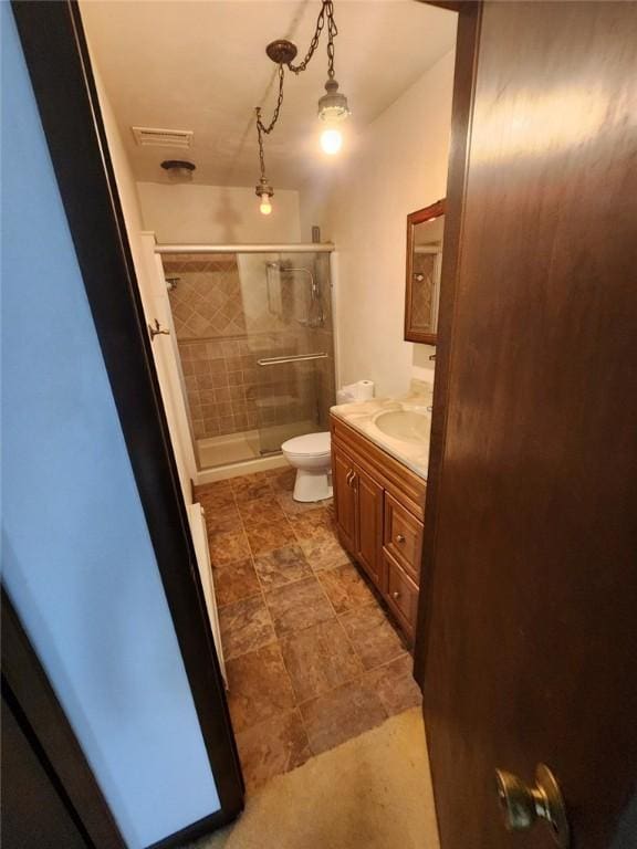 219 Meadow Dr, Westmont Hilltop School District, PA 15905 - bathroom featuring vanity, toilet, visible vents, and a stall shower