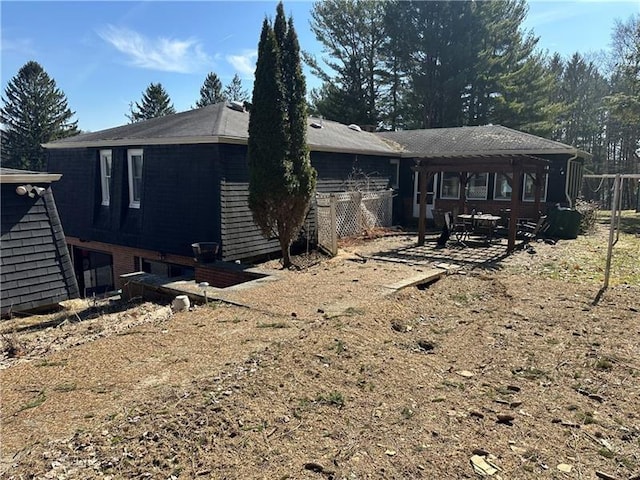219 Meadow Dr, Westmont Hilltop School District, PA 15905 - back of property with fence and a patio