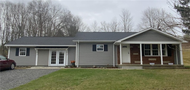 1960 E End Rd, Shippenville, PA 16254 - single story home featuring a porch, french doors, brick siding, and a front yard