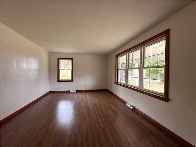 1960 E End Rd, Shippenville, PA 16254 - unfurnished room with baseboards, dark wood-style floors, and visible vents