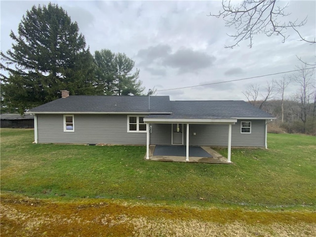 1960 E End Rd, Shippenville, PA 16254 - back of house with a lawn, a chimney, and a patio