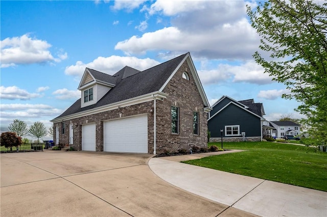 view of side of home featuring concrete driveway, brick siding, fence, and a lawn
