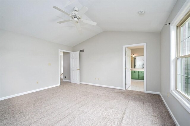 1004 Augusta Ln, Penn Twp Wml, PA 15644 - unfurnished bedroom with carpet flooring, lofted ceiling, multiple windows, ensuite bathroom, and baseboards