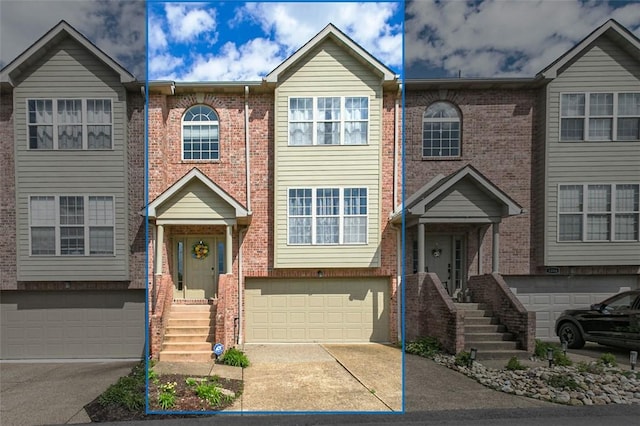 1004 Augusta Ln, Penn Twp Wml, PA 15644 - multi unit property with concrete driveway, a garage, and brick siding