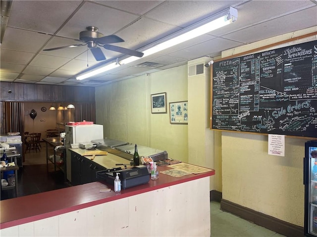 557 Mckean Ave, Donora, PA 15033 - office area featuring ceiling fan, a drop ceiling, and baseboards