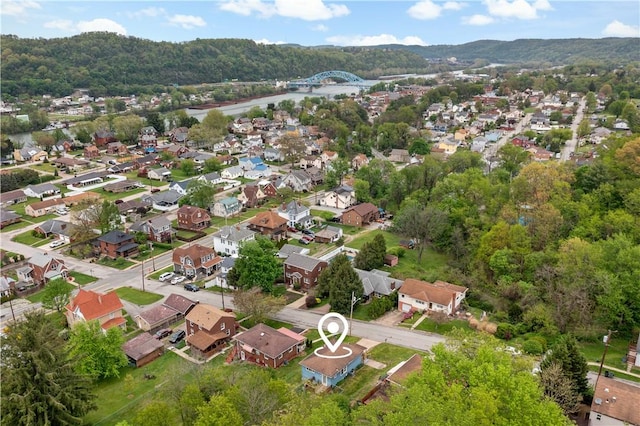 birds eye view of property with a residential view and a mountain view