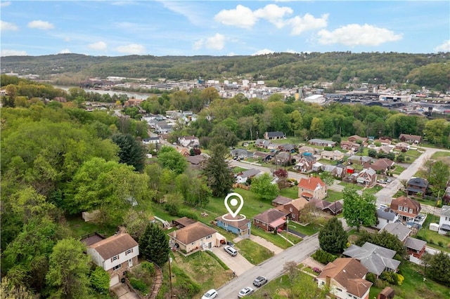 birds eye view of property with a residential view