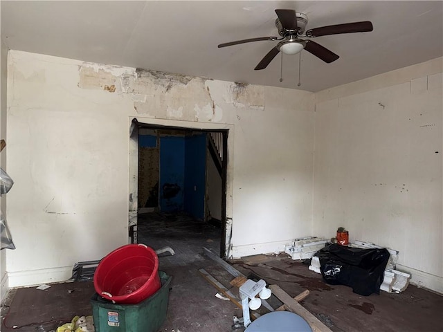 unfurnished room with ceiling fan