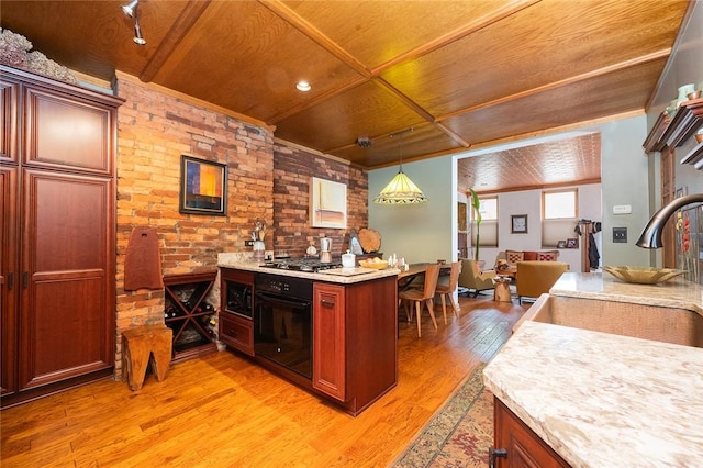 2220 Sarah St, South Side, PA 15203 - kitchen featuring oven, light wood-type flooring, wood ceiling, a sink, and light countertops