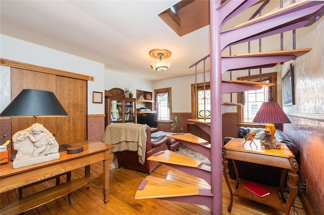2220 Sarah St, South Side, PA 15203 - living area featuring hardwood / wood-style flooring and a wainscoted wall