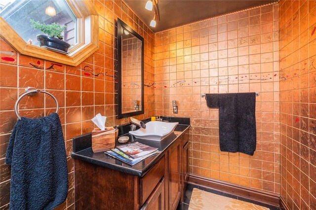 2220 Sarah St, South Side, PA 15203 - bathroom featuring tile walls and vanity