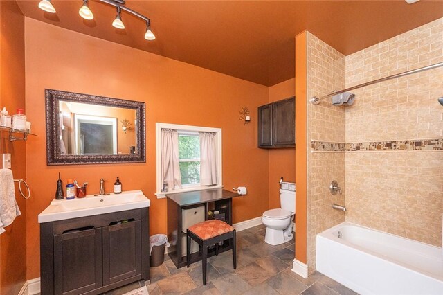 2220 Sarah St, South Side, PA 15203 - bathroom with toilet, baseboards, vanity, and shower / bath combination