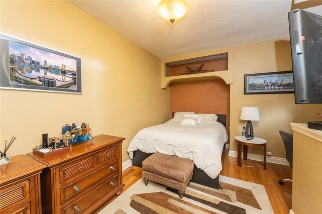 2220 Sarah St, South Side, PA 15203 - bedroom featuring wood finished floors and baseboards