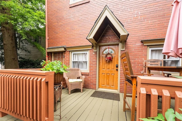 2220 Sarah St, South Side, PA 15203 - entrance to property with a wooden deck and brick siding