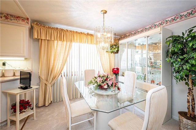 1079 Hedy Lynn Dr, North Huntingdon, PA 15642 - dining area with a chandelier and light colored carpet
