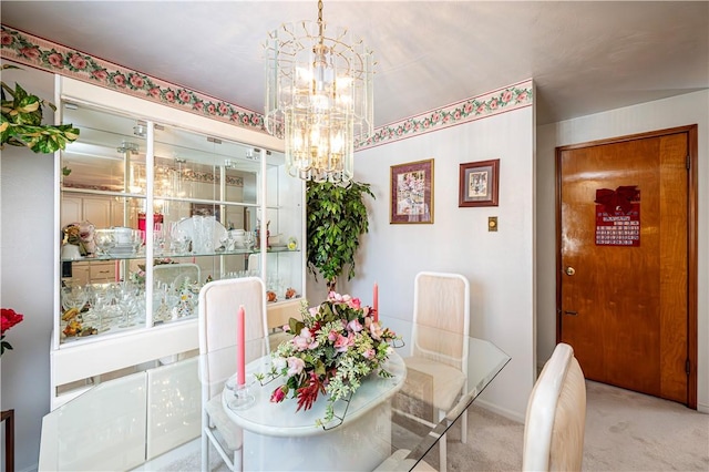 1079 Hedy Lynn Dr, North Huntingdon, PA 15642 - carpeted dining room with a chandelier and baseboards