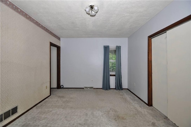 3053 Scheinbach Rd, Jefferson Hills, PA 15332 - carpeted empty room with a textured ceiling