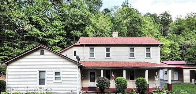 3053 Scheinbach Rd, Jefferson Hills, PA 15332 - view of front facade with a porch and a chimney