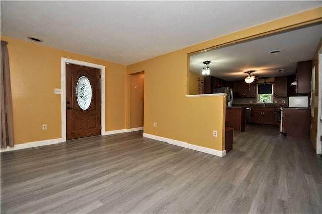 3053 Scheinbach Rd, Jefferson Hills, PA 15332 - foyer entrance featuring wood finished floors, baseboards, and a ceiling fan