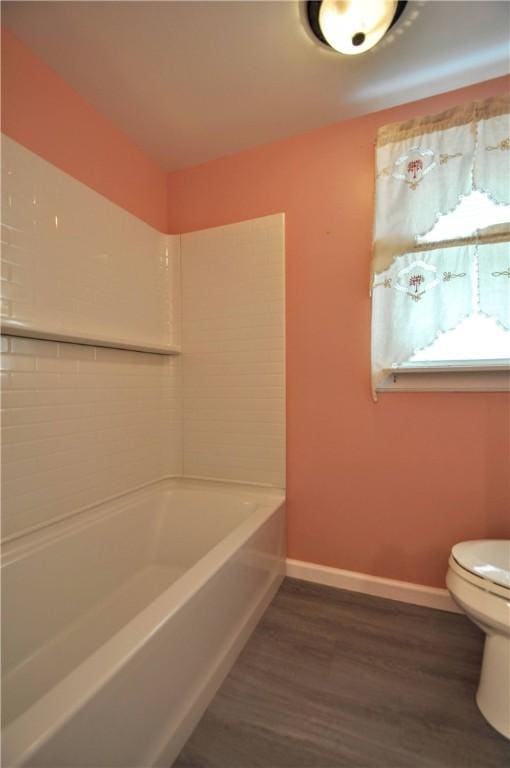 3053 Scheinbach Rd, Jefferson Hills, PA 15332 - bathroom featuring toilet, wood finished floors, baseboards, and  shower combination