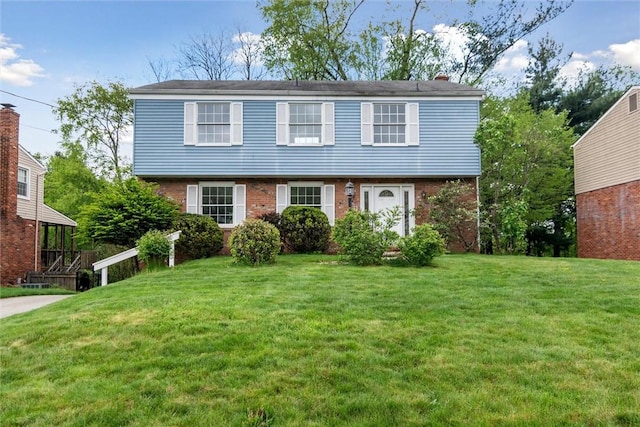 179 Kelvington Dr, Monroeville, PA 15146 - colonial house with a front lawn and brick siding