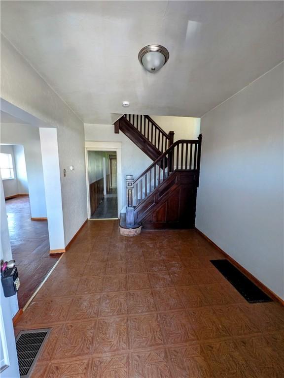330 Quincy Ave, Mount Oliver, PA 15210 - foyer with stairs and baseboards