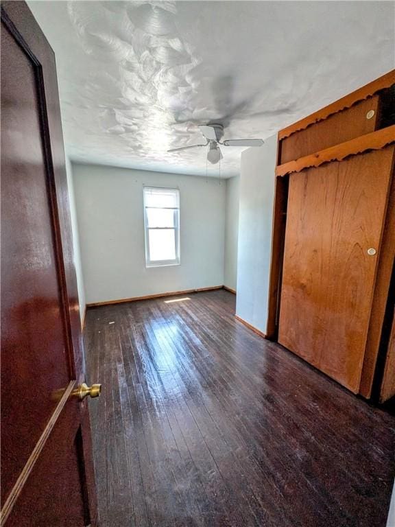 330 Quincy Ave, Mount Oliver, PA 15210 - unfurnished bedroom with hardwood / wood-style floors, baseboards, and a ceiling fan