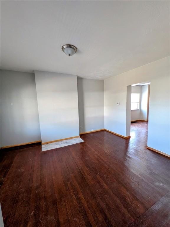 330 Quincy Ave, Mount Oliver, PA 15210 - empty room with wood-type flooring and baseboards