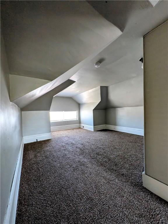 330 Quincy Ave, Mount Oliver, PA 15210 - additional living space with carpet, vaulted ceiling, and baseboards