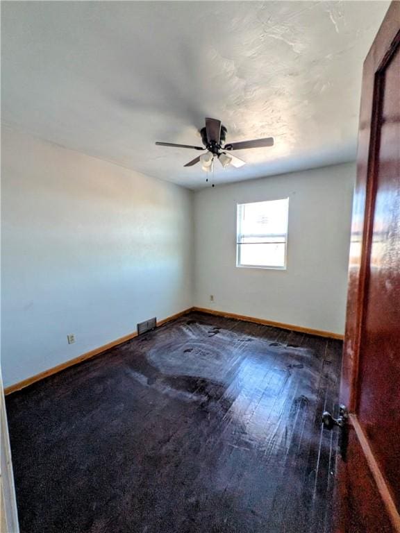 330 Quincy Ave, Mount Oliver, PA 15210 - unfurnished room featuring baseboards, a ceiling fan, and wood finished floors