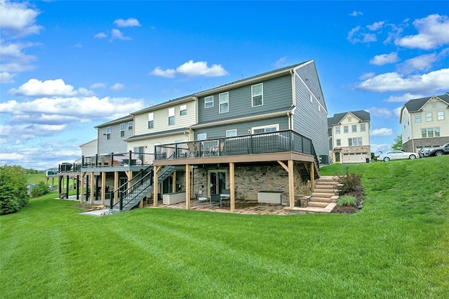 7005 Augusta Ln, Penn Twp Wml, PA 15644 - back of house featuring stairs, a wooden deck, a lawn, and a patio area