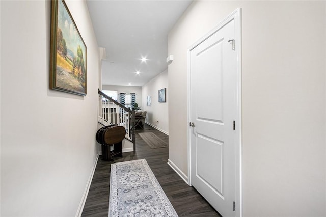 7005 Augusta Ln, Penn Twp Wml, PA 15644 - hall with baseboards, dark wood finished floors, and stairway