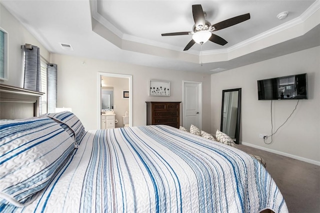 7005 Augusta Ln, Penn Twp Wml, PA 15644 - carpeted bedroom featuring a raised ceiling, ornamental molding, baseboards, connected bathroom, and a ceiling fan