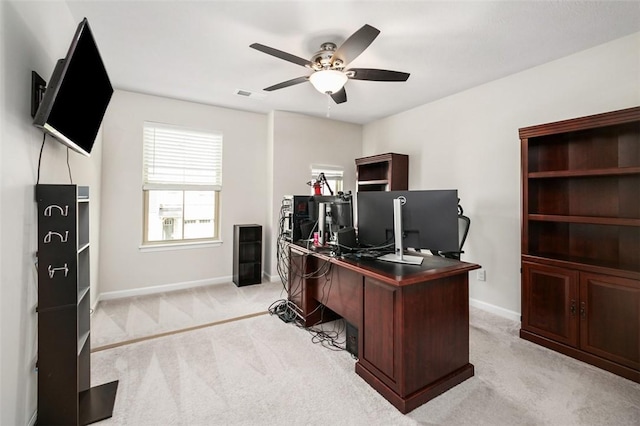 7005 Augusta Ln, Penn Twp Wml, PA 15644 - office area featuring light carpet, ceiling fan, and baseboards