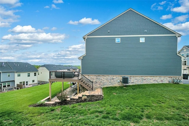 7005 Augusta Ln, Penn Twp Wml, PA 15644 - view of property exterior featuring a wooden deck, a yard, a patio, stairway, and a residential view